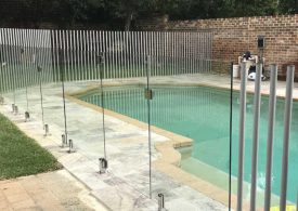 Custom pool fences improve backyard aesthetic